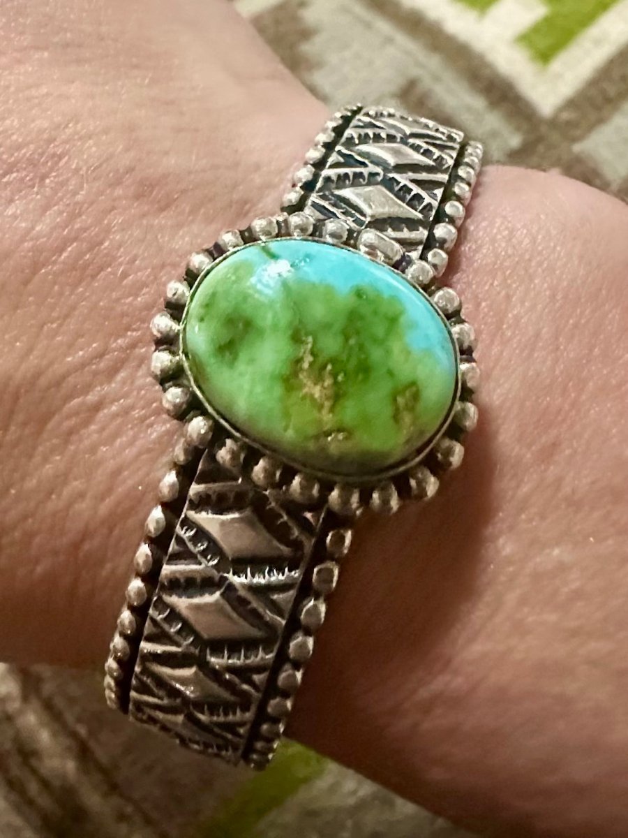 Ornate Deep Stampwork with Central Sonoran Gold Stone Cuff, by Johnathan Nez - Turquoise Mustang
