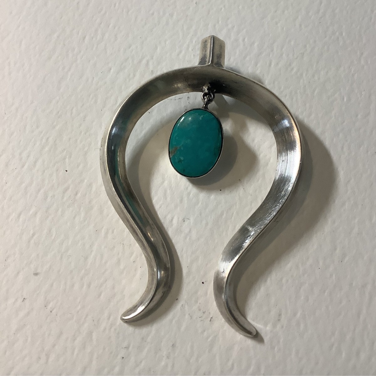 Pendant, Naja, Medium cast with oval turquoise pendulum, DD - Turquoise Mustang
