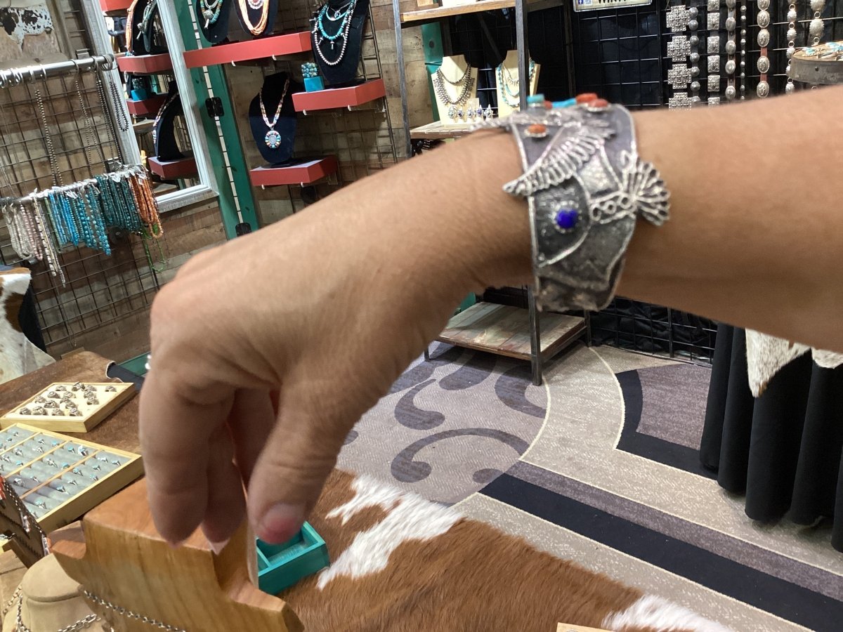 Stunning Tufa Cast with Hummingbird Kachina motif and Cobblestone inlay featuring turquoise,coral, and lapis by Lester James - Turquoise Mustang