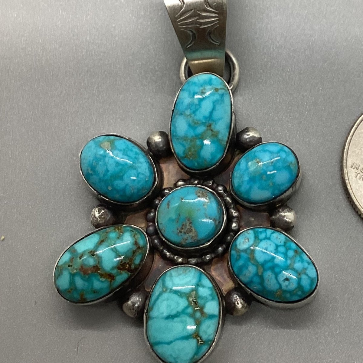 Pendant, 7 stone cluster, Premium Kingman Birdseye 25 ct, Medium, Peterson Johnson - Turquoise Mustang
