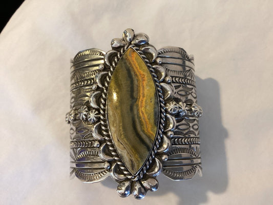 Bracelet, extra wide cuff, Bumble Bee Jasper, football shape, Chris Yazzie - Turquoise Mustang