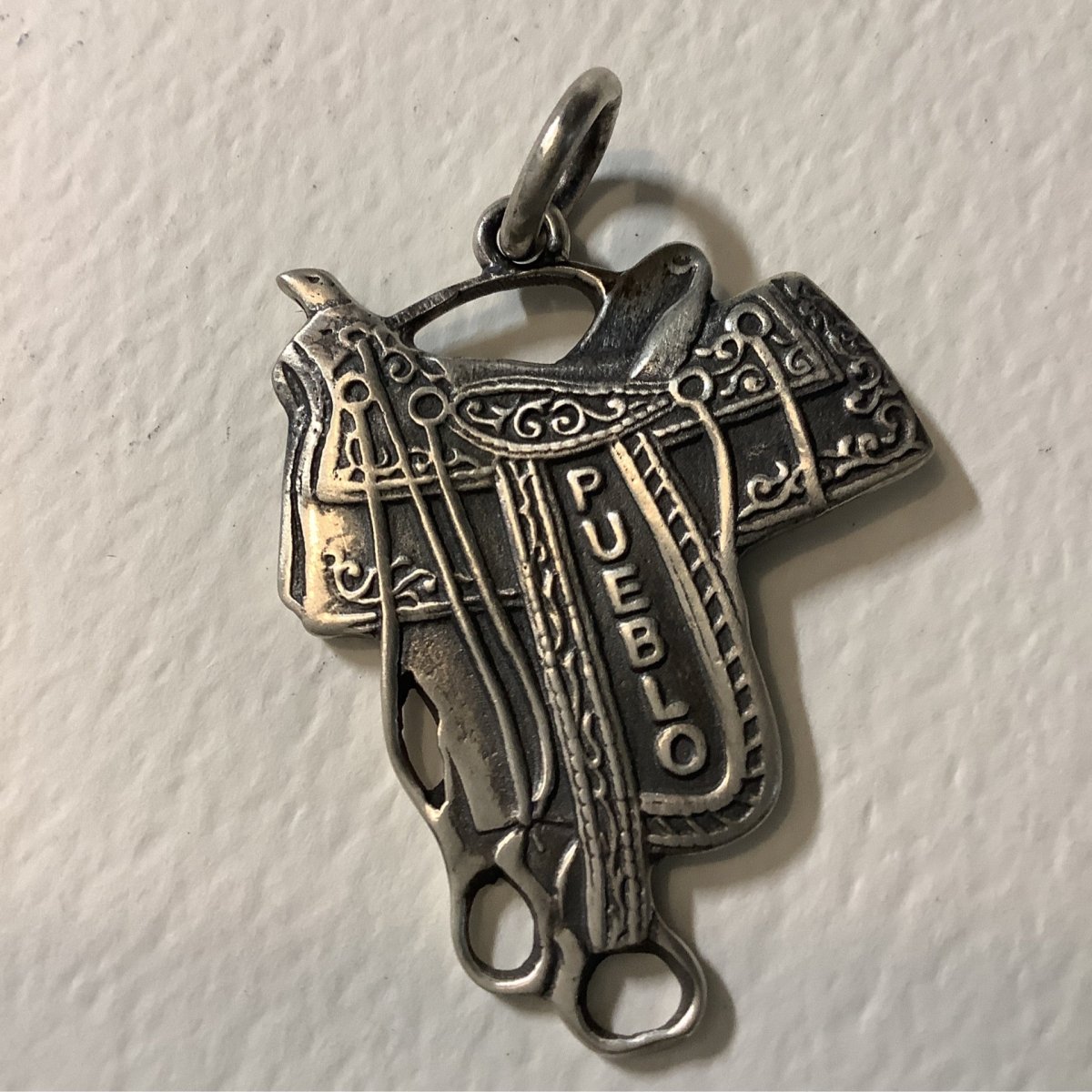 Pendant, Charm, All Silver Pueblo Saddle tag, DD - Turquoise Mustang