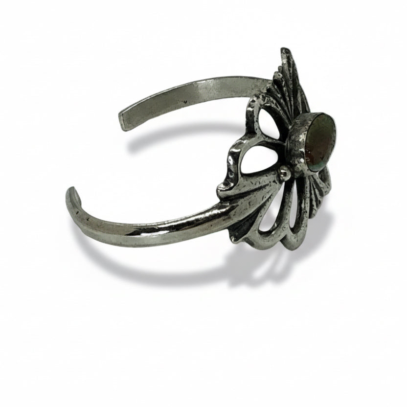Tufa Cast Cuff With Oval Royston Turquoise center by Emma & Wilson Carviso, Jr - Turquoise Mustang