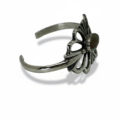 Tufa Cast Cuff With Oval Royston Turquoise center by Emma & Wilson Carviso, Jr - Turquoise Mustang