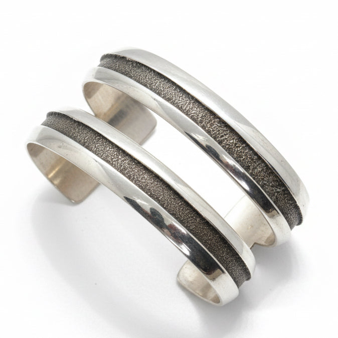 All Silver Split Racetrack Tufa Cast Cuff by Bennie Bowakaty - Turquoise Mustang