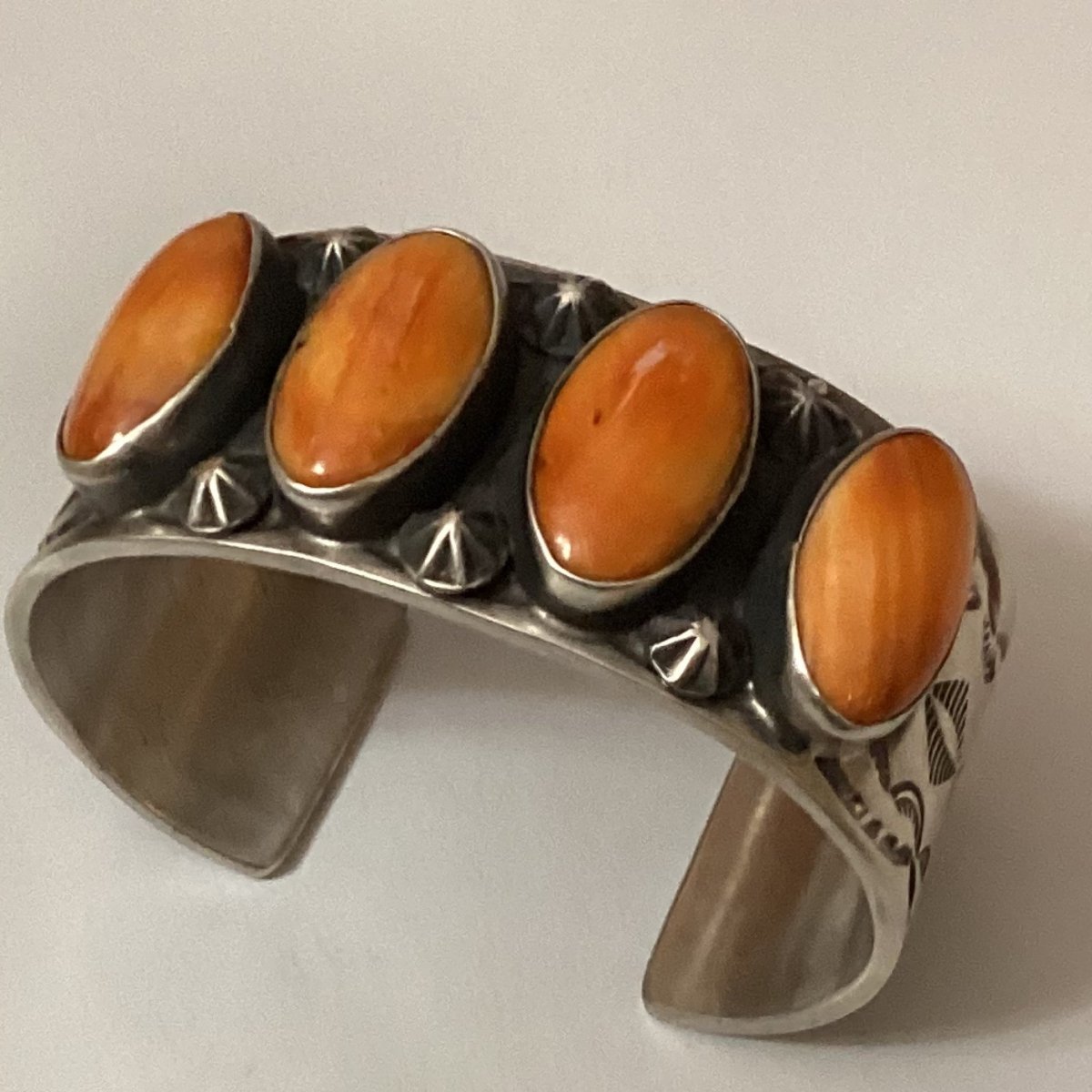 Bracelet, Stamped Silver cuff with 3 oval Orange Spiny Oyster , Chimney Butte - Turquoise Mustang