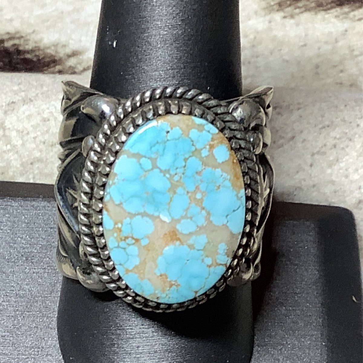 Ring, Oval 8, wide stampwork shank, Delbert Gordon - Turquoise Mustang