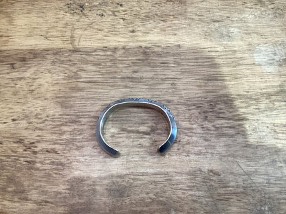 Bracelet, Early (circa 1970) heavy triangle wire, stamped cuff attributed to Tahe family - Turquoise Mustang