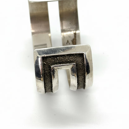 All Silver Split Racetrack Tufa Cast Cuff by Bennie Bowakaty - Turquoise Mustang