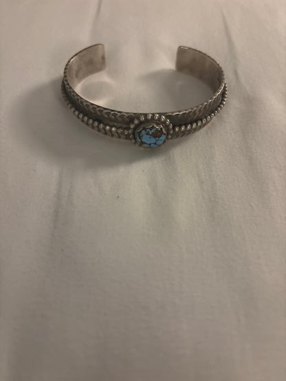 Bracelet, narrow cuff, Golden Hills Turquoise, round freeform, Tillie John - Turquoise Mustang