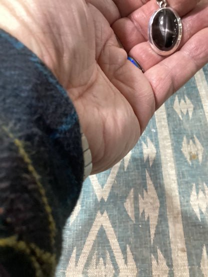 Pendant, oval, black star sapphire , 1.75” long, beveled bezel, TM - Turquoise Mustang