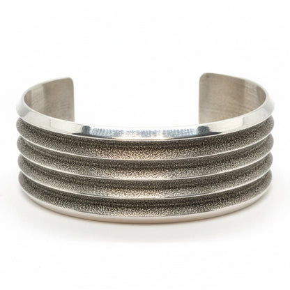 All - Sterling Tufa Cast Cuff Bracelet with Four - Groove Design, Bennie Bowakaty (Zuni) - Turquoise Mustang