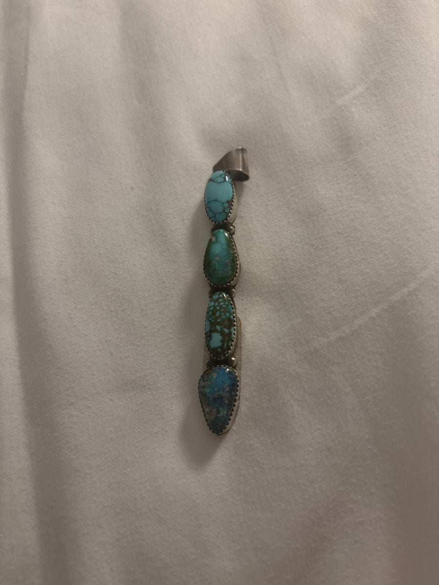 Pendant, 5 - stone, pear shape mixed premium turquoise, sawtooth bezel, Tia Long - Turquoise Mustang