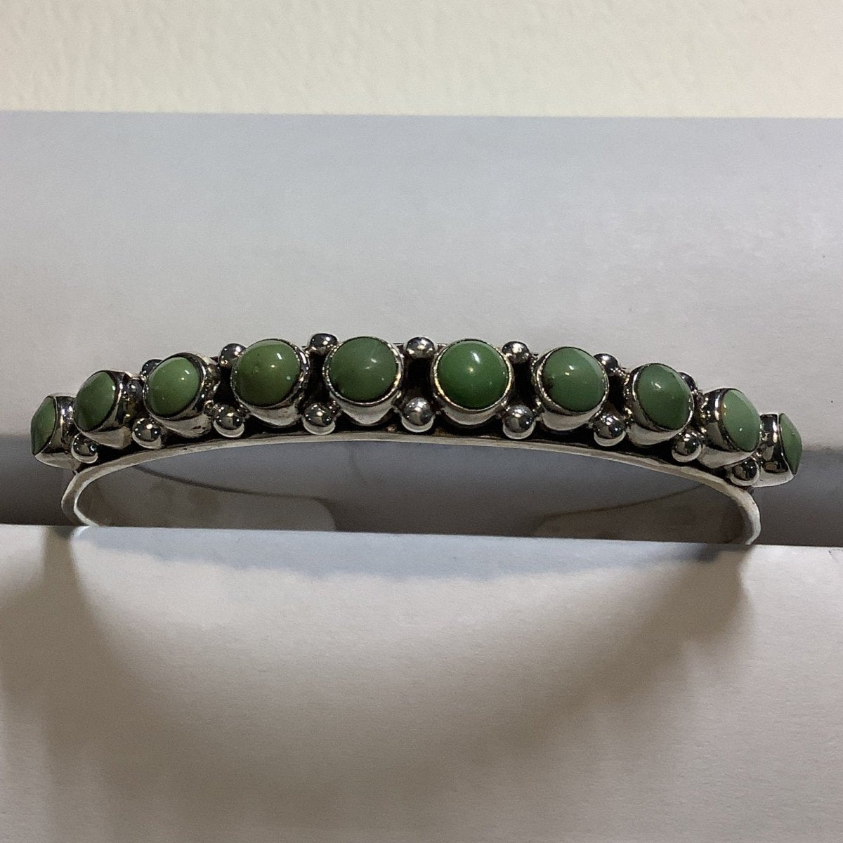 Bracelet, 11 stone Round Turquoise Cuff, DD - Turquoise Mustang