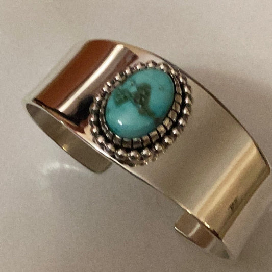 Bracelet, bright unstamped silver, Sonoran Gold turquoise, raindrop & dental bezels, D. Benally - Turquoise Mustang