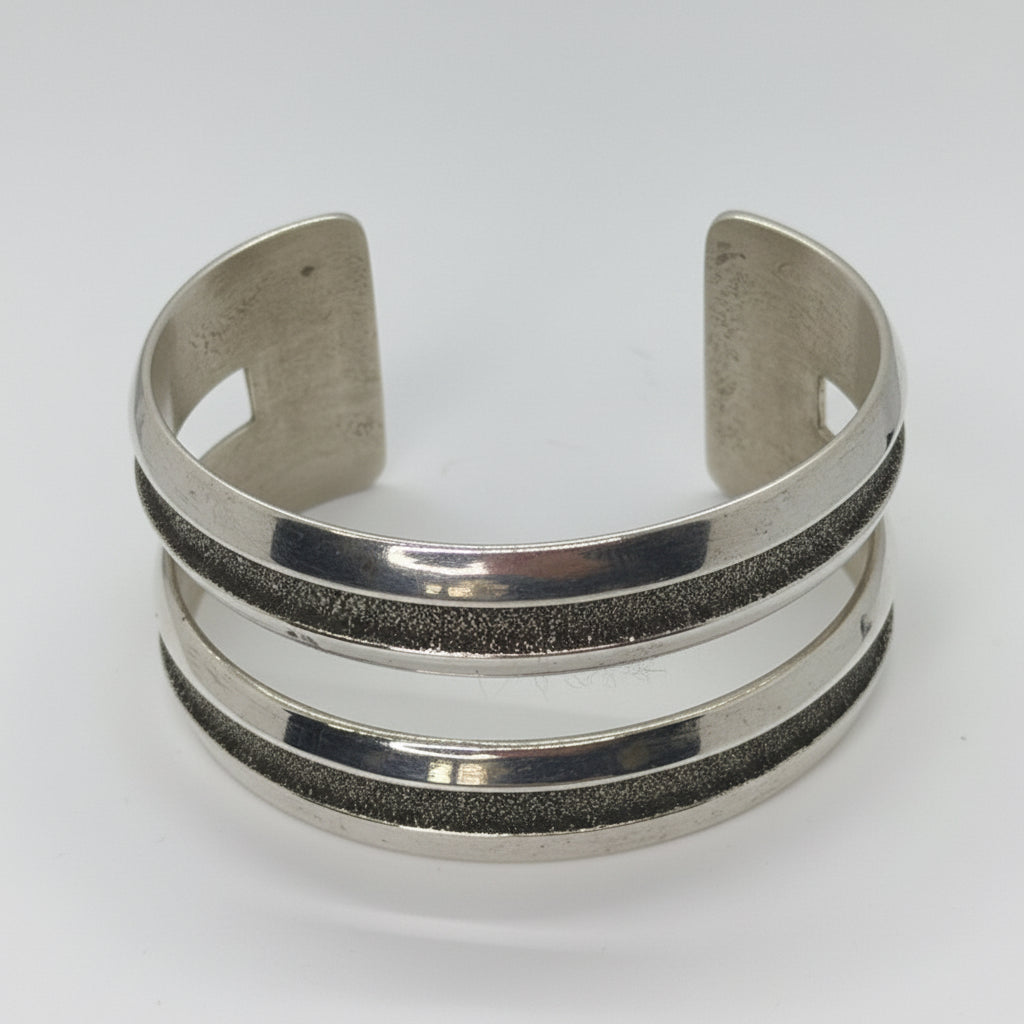 All Silver Split Racetrack Tufa Cast Cuff by Bennie Bowakaty - Turquoise Mustang